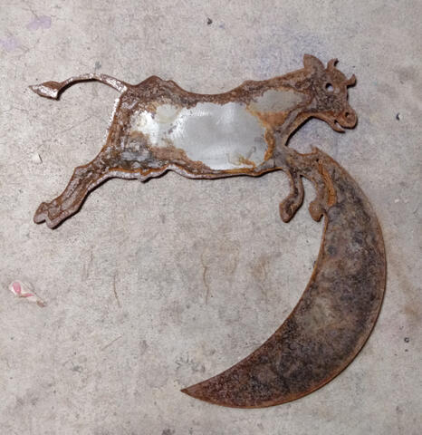 Cow jumping over the moon (rusted steel)