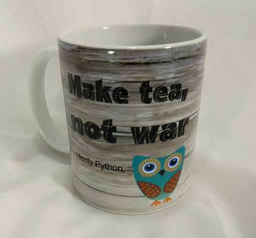 Make tea, not war- owl coffee mug by Monty Python